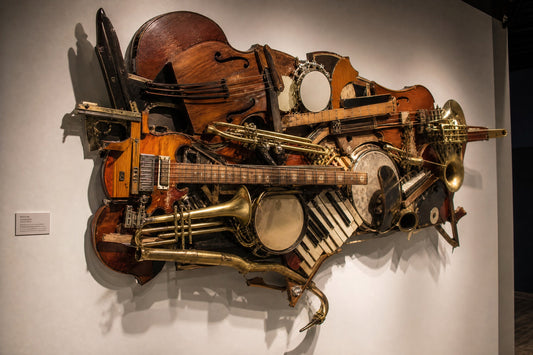 Wall sculpture made from upcycled broken musical instruments