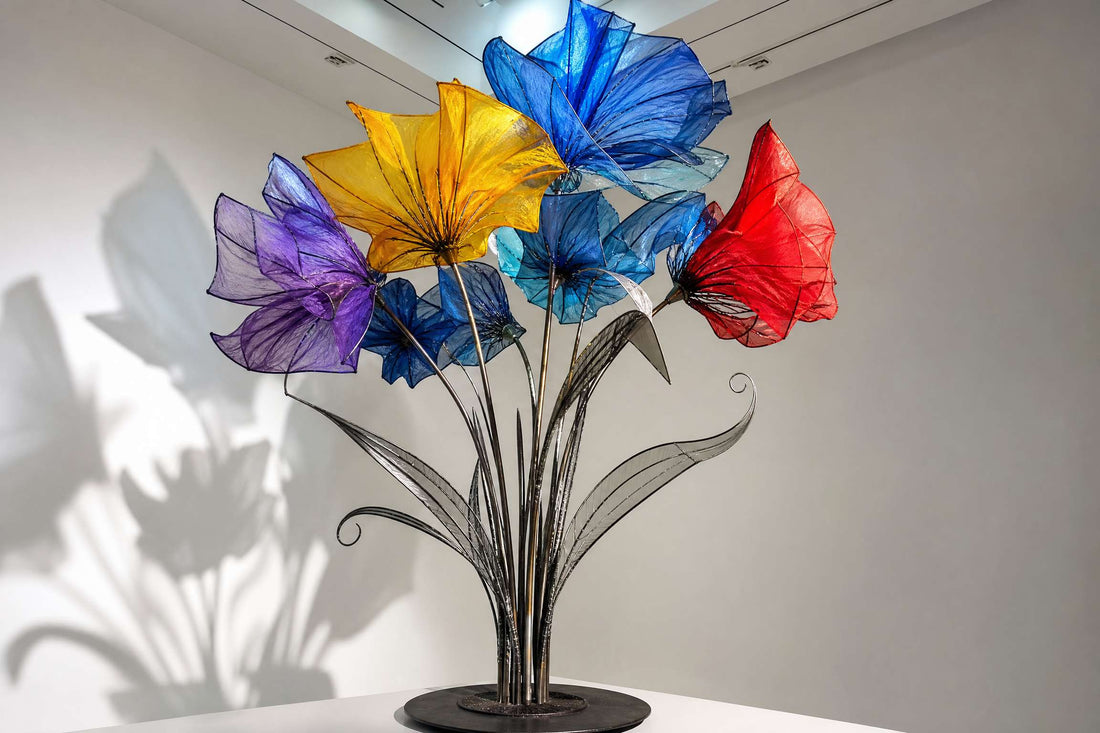 Luminous flower sculpture made from discarded umbrellas
