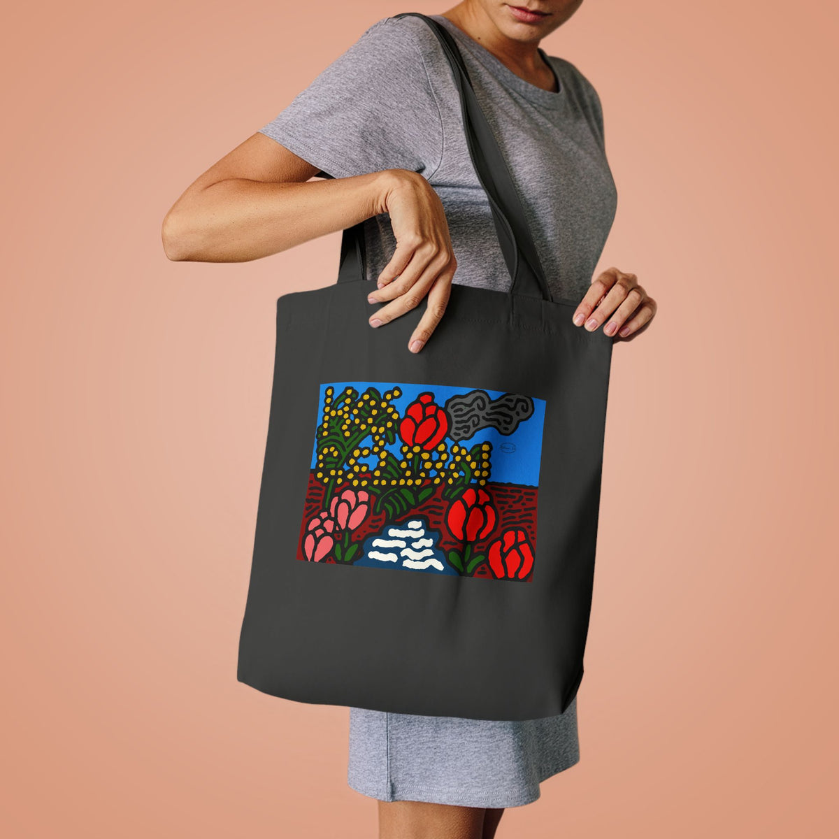 A field of tulips next to a wattle Classic Tote Bag