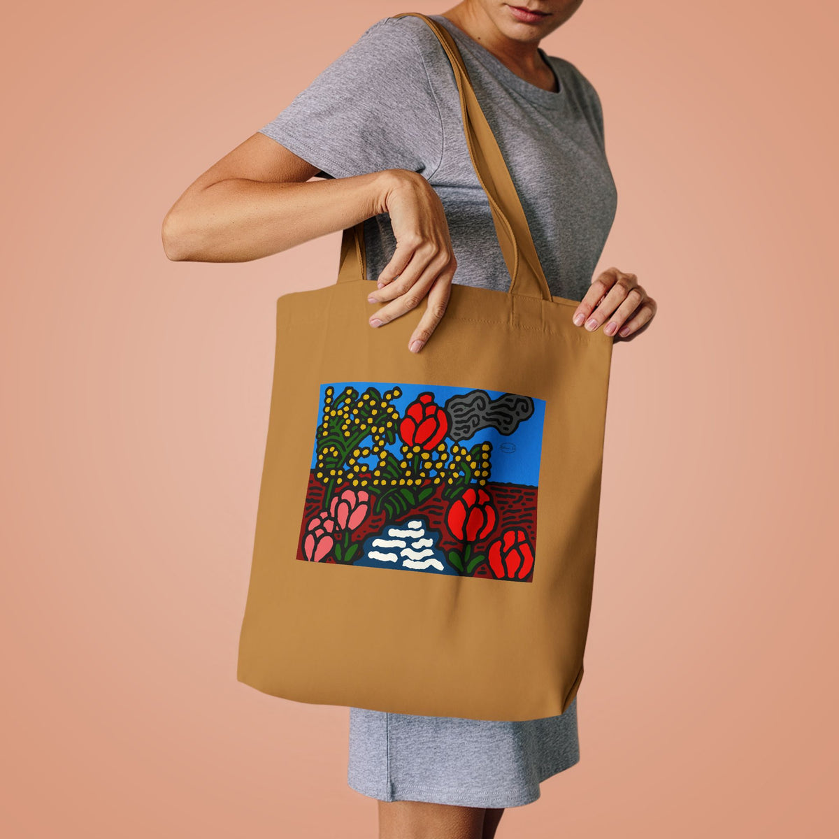 A field of tulips next to a wattle Classic Tote Bag