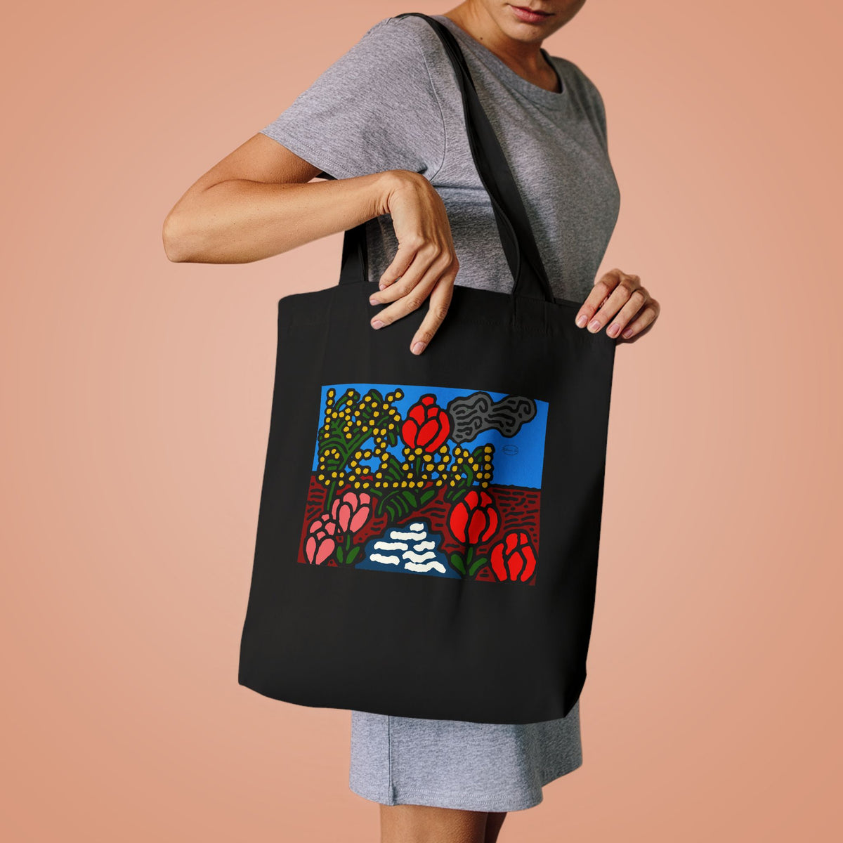 A field of tulips next to a wattle Classic Tote Bag