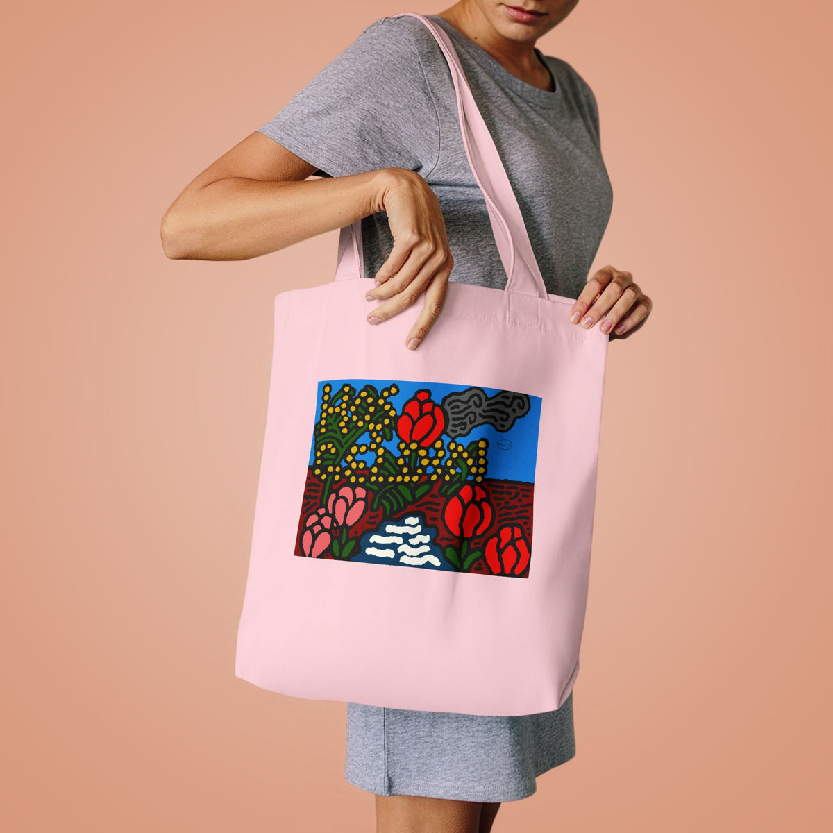 A field of tulips next to a wattle Classic Tote Bag
