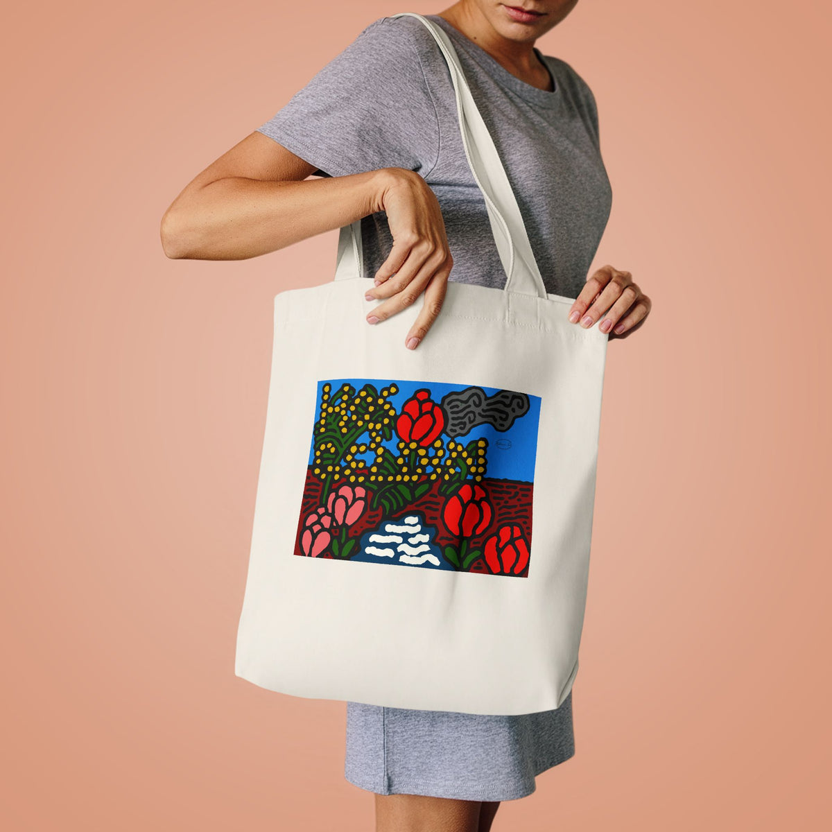 A field of tulips next to a wattle Classic Tote Bag