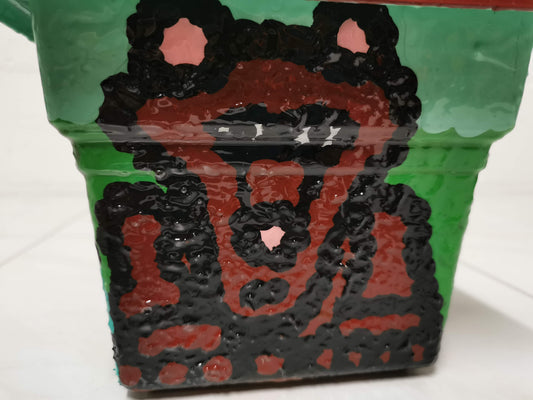 Upcycled resin pot designed to bring good luck to those born in the year of the Tiger
