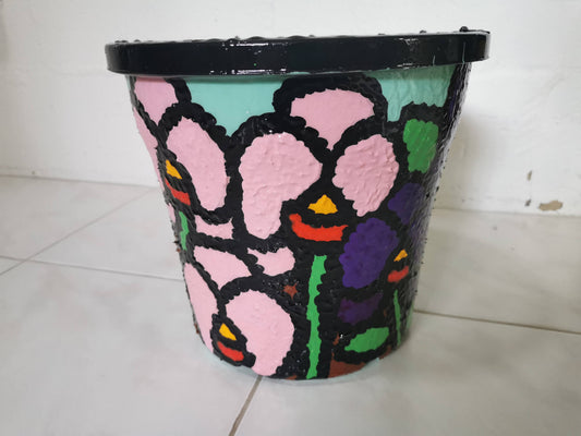 Upcycled orchid resin plant pot