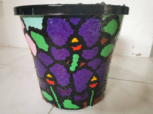 Upcycled orchid resin plant pot